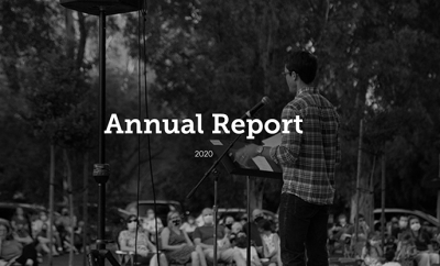 Black and White photo of Pastor Garrett leading outdoor worship