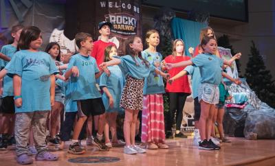 Group of children at Vacation Bible School singing