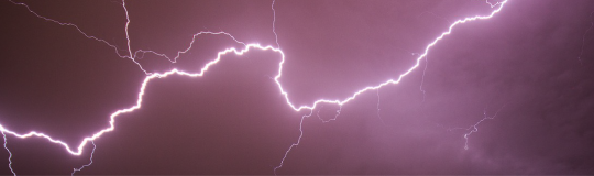 lightning in a purple sky