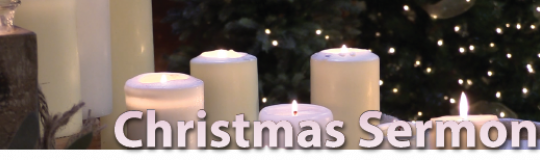 white Christmas candles on church altar